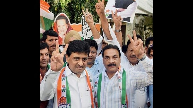 Maharashtra Congress chief Ashok Chavan (left) and party workers celebrate the party’s win in the Nanded municipal elections. (PTI)