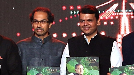 Uddhav Thackeray and Devendra Fadnavis at a book launch event (STR/AFP/Getty Images)