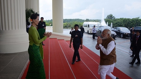  Prime Minister Narendra Modi greets Myanmar’s State Counsellor Aung San Suu Kyi (L) in Naypyidaw. (AUNG HTET/AFP/Getty Images)