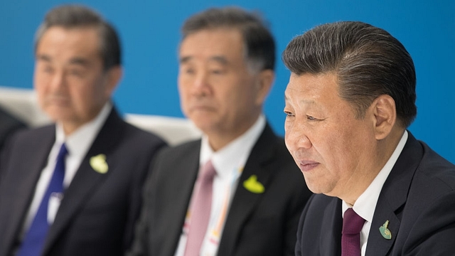 Chinese President Xi Jingping, right. (Matt Cardy/Getty Images)