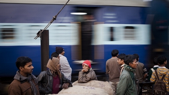 Migrant workers at the Nizamuddin Railway Station in New Delhi. (Daniel Berehulak/GettyImages)