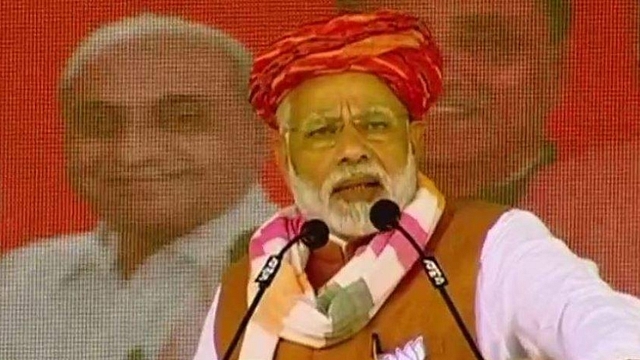 PM Narendra Modi addresses rally in Bhuj. (ANI/Twitter)