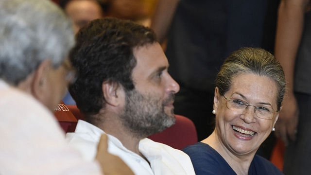  Congress vice-president Rahul Gandhi, centre,&nbsp; and Congress president Sonia Gandhi, right, talking to CPI (M) leader Sitaram Yechury.  (Sonu Mehta/Hindustan Times via Getty Images)