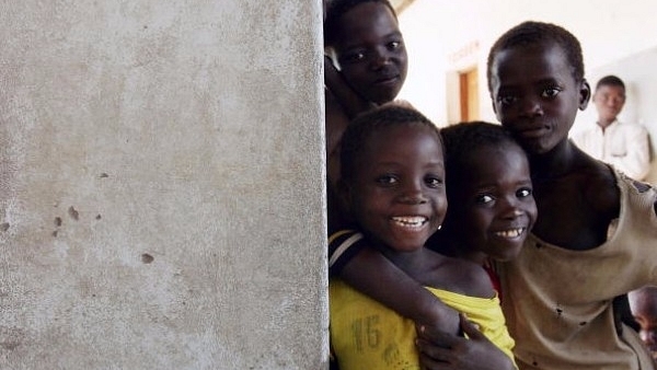  A group of young African boys is seen in the streets of a small village in Mozambique. (Graeme Robertson/Getty Images)