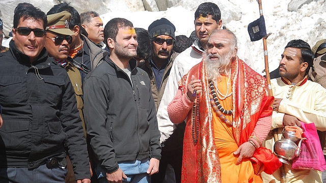 Congress Vice President Rahul Gandhi with the head priest Bheemashankar Ling at Kedarnath shrine on April 24, 2015 at Kedarnath (Vinay Santosh Kumar/Hindustan Times via Getty Images)