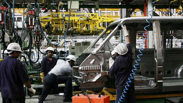 Automobiles  Workers at an assembling plant (Manoj Patil/Hindustan Times via Getty Images)