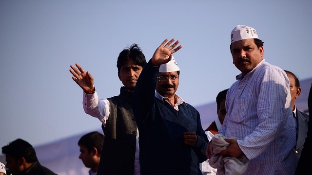 Kumar Vishwas (left) with Arvind Kejriwal (centre). (Pradeep Gaur/Mint via Getty Images)