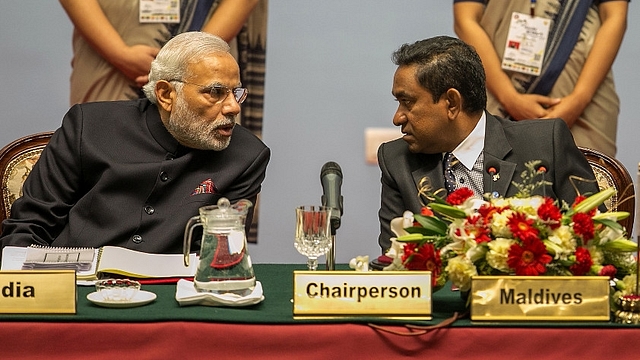 Prime Minister Narendra Modi speaks to Abdulla Yameen, President of the Maldives in Kathmandu, Nepal. (Narendra Shrestha - Pool/GettyImages)