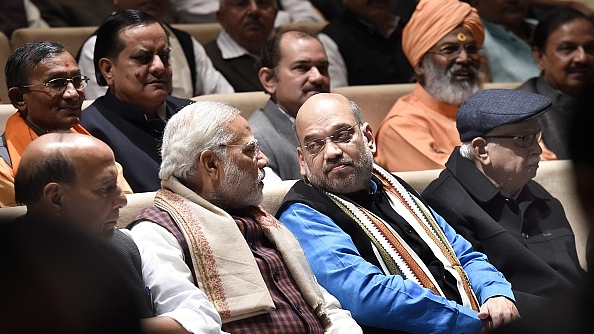 Prime Minister Narendra Modi (2L), Home Minister Rajnath Singh (L), BJP president Amit Shah (2R) and L K Advani celebrate after success in Gujarat. (Arvind Yadav/Hindustan Times)