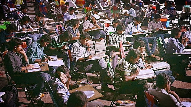 Indian students preparing for an examination (NOAH SEELAM/AFP/Getty Images)