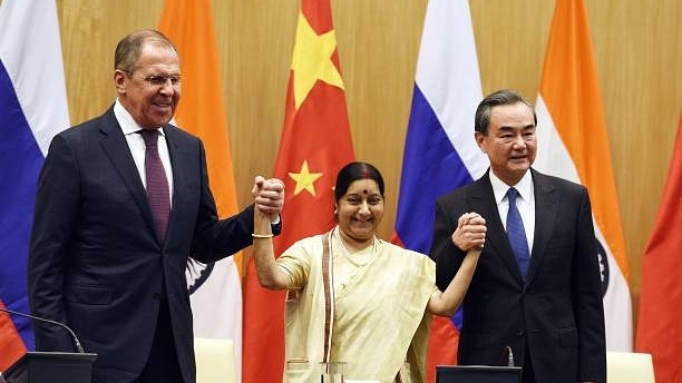 Russian Foreign Minister Sergey Lavrov (L), External Affairs Minister Sushma Swaraj (C) and Chinese Foreign Minister Wang Yi after a joint press conference  in New Delhi. (Raj K Raj/Hindustan Times via Getty Images)