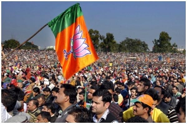 BJP supporters and workers during  Lalkar rally on 1 December 2013 held by then BJP prime ministerial candidate  Narendra Modi. (Nitin Kanotra/Hindustan Times via GettyImages)