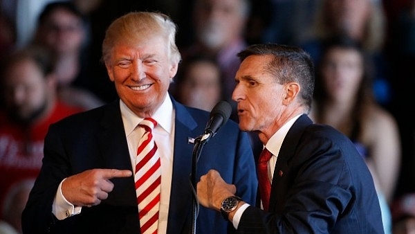 United States President Donald Trump (L) and former national security adviser retired General Michael Flynn at a rally in Colorado. (George Frey/Getty Images)