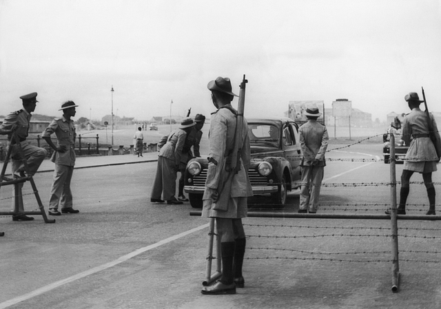 Police at a special roadblock, set up during the parliamentary debate on the Tamil Languages Bill, in Columbo, Sri Lanka, 11 August 1958. (Keystone/Hulton Archive/Getty Images)&nbsp;