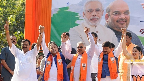 It all began when Mamata’s former aide Mukul Roy (second from left) joined the BJP.  (Samir Jana/Hindustan Times via Getty Images)