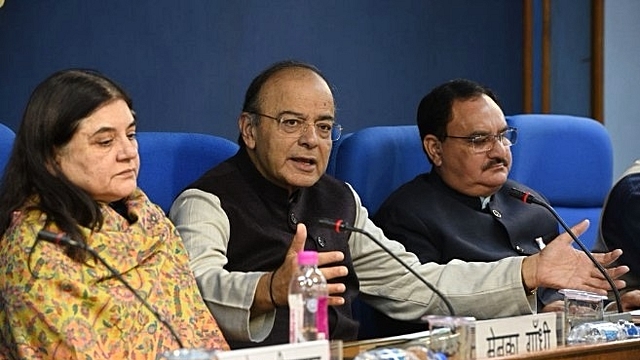 Finance Minister Arun Jaitley (centre) with Women and Child Development Minister Maneka Gandhi (left) and Health Minister J P Nadda. (Mohd Zakir/Hindustan Times via Getty Images)