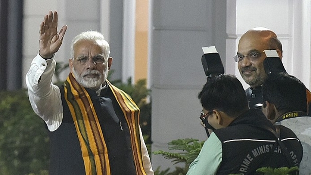 Prime Minister Narendra Modi arrives at the BJP headquarters at Ashoka Road in New Delhi. (Raj K Raj/Hindustan Times)