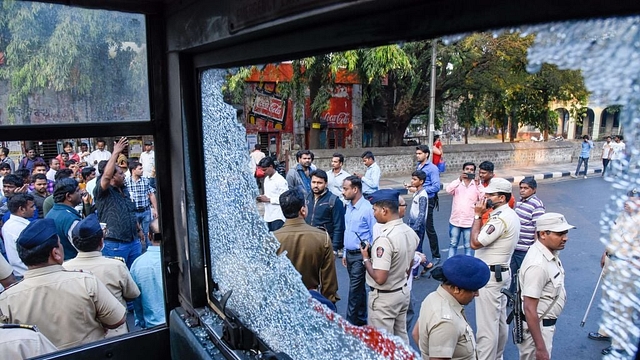  Violent protests erupted in several parts of Mumbai and Thane, with protesters damaging buses, blocking roads, staging rail rokos and forcing shops to shut down (Sanket Wankhade/Hindustan Times via Getty Images)