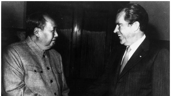 Chinese communist leader Chairman Mao Zedong (1893 - 1976) shakes hands with American president Richard Nixon (1914 - 1994) in Peking (Beijing) during his visit to China. (Photo by Keystone/Getty Images)