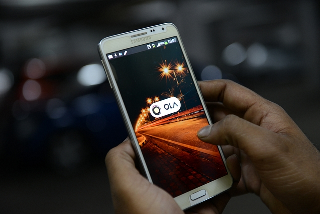 The Ola app (Hemant Mishra/Mint via Getty Images)