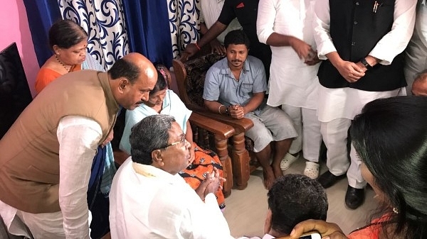 Karnataka Chief Minister S Siddaramaiah visiting Deepak Rao’s house; his cabinet colleague U T Khader, MLA Mohideen Bava and MLC Ivan D’Souza are seen.