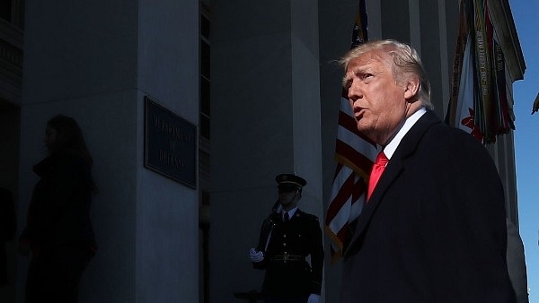 US President Donald Trump walks into the Pentagon in Arlington, Virginia. (Mark Wilson/Getty Images)