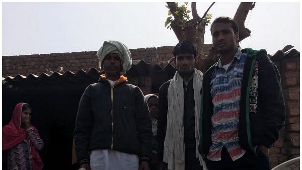 Shri Kishen (wearing headgear) with his family members