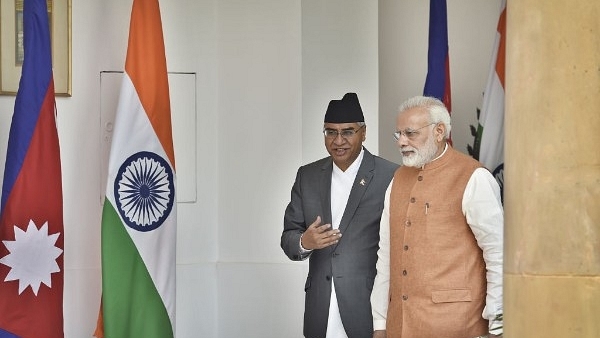 Prime Minister Narendra Modi with Nepalese Prime Minister Sher Bahadur Deuba before a meeting at Hyderabad House in 2017. (Ajay Aggarwal/Hindustan Times via Getty Images)