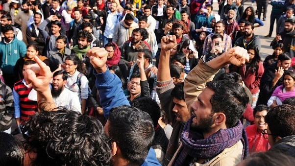 Students in Jawaharlal Nehru University protesting (Burhaan Kinu/Hindustan Times via Getty Images)