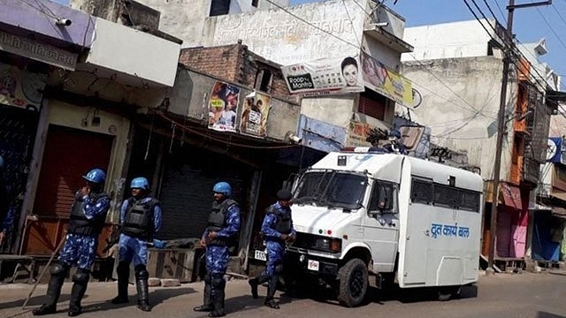 Security forces patrol areas near Kasganj in Uttar Pradesh. 