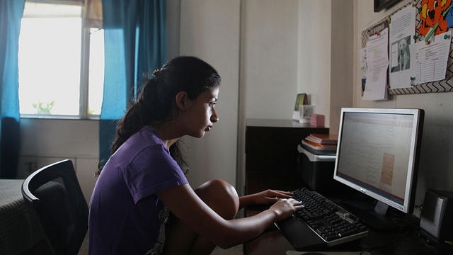 Vanya Bisht using the internet on an LCD desktop. (Sattish Bate/Hindustan Times via Getty Images)