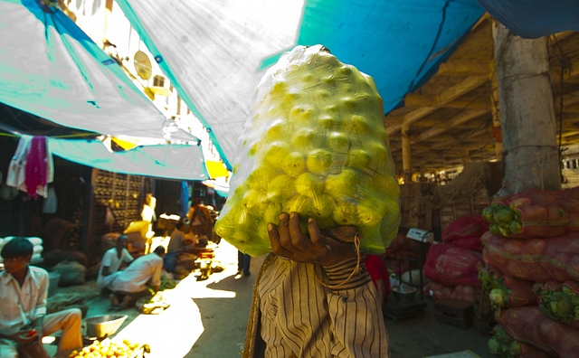 A wholesaler selling vegetables in Azadpur Vegetable in New Delhi, India. (Sneha Srivastava/Mint via Getty Images)