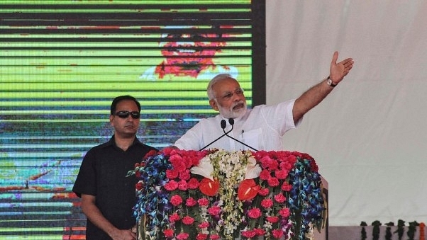 Prime Minister Narendra Modi addresses a gathering during a public meeting in Varanasi. (Rajesh Kumar/Hindustan Times via Getty Images)