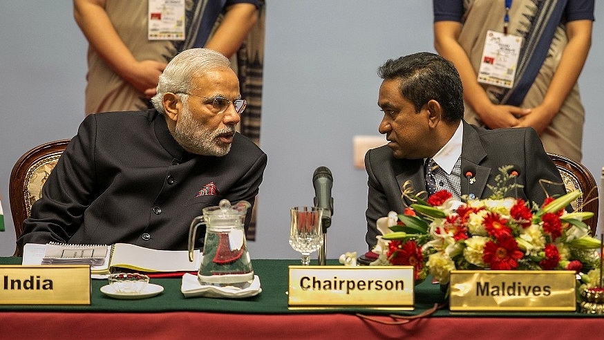 Prime Minister Narendra Modi speaks to Abdulla Yameen, President of the Maldives during  the 18th SAARC Summit in  Nepal. (Narendra Shrestha - Pool/Getty Images)