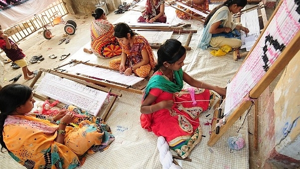 A young generation of weavers of Sambalpuri Ikat at Bargarh, Odisha. (Indranil Bhoumik/Mint via GettyImages)&nbsp;