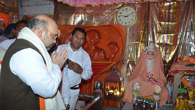  Bharatiya Janata Party president Amit Shah paying his respects at the historical Ram Tirath Temple on May 3, 2015 in Amritsar, India. (Sameer Sehgal/Hindustan Times via Getty Images)