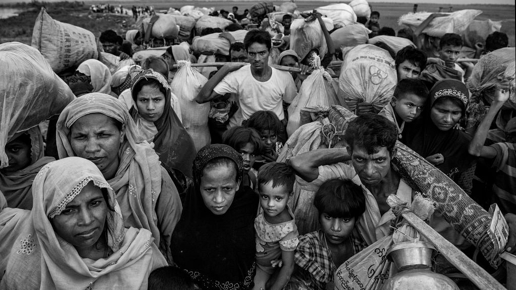 Representative image: Rohingya Muslim refugees crowd as they wait to proceed to camps (Kevin Frayer/Getty Images)