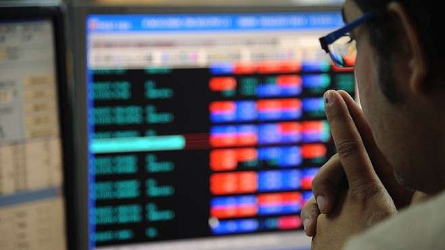 An investor monitoring the Indian stock market (INDRANIL MUKHERJEE/AFP/Getty Images) 