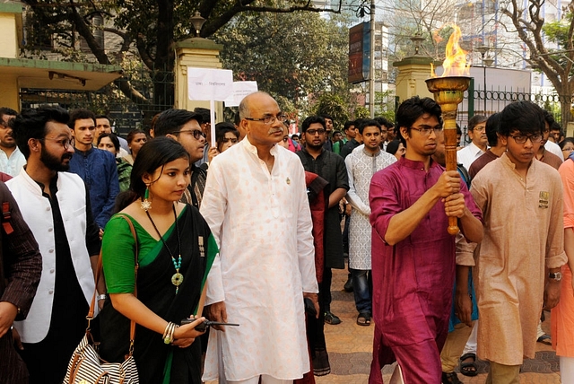 St Xavier’s College (Calcutta) Alumni Association along with students from Bangladesh at a torch rally to celebrate the International Mother Language Day in Kolkata. (Samir Jana/Hindustan Times via Getty Images)&nbsp;