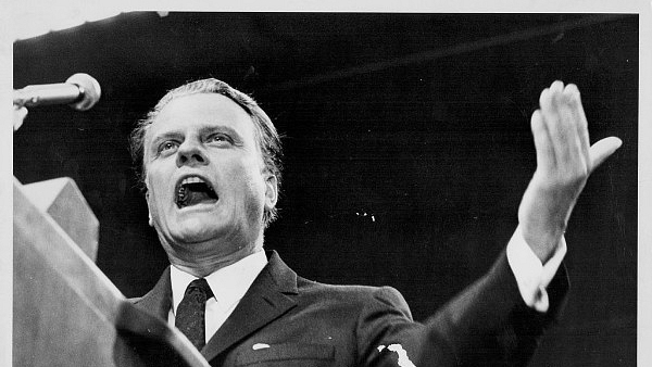 American evangelist Billy Graham, giving a speech at Earl’s Court, London, on 2 June 1960. (Ted West/Central Press/Getty Images)