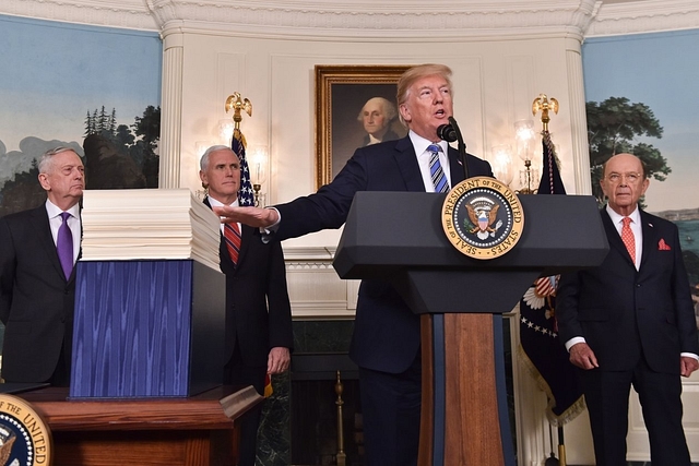 United States President Donalnd Trump talking about the spending bill in the White House on Friday (Nicholas Kamm/AFP via Getty Images)