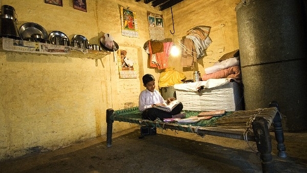 A house in rural India gets electricity for the first time. (Priyanka Parashar/Mint via Getty Images)