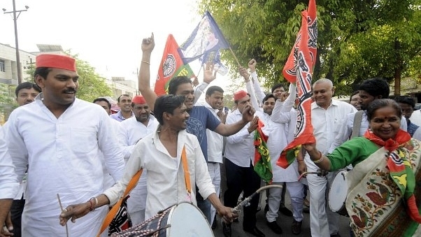 SP workers along with BSP members celebrate after winning the Lok Sabha election seats in Uttar Pradesh in Noida. (Sunil Ghosh/Hindustan Times via Getty Images)