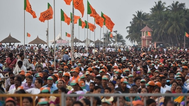 People gathered at Maple beach for BJP national President Amit Shah’s speech during Fishermen’s convention at Maple beach on February 20, 2018 in Udupi, India. (Arijit Sen/Hindustan Times via Getty Images)