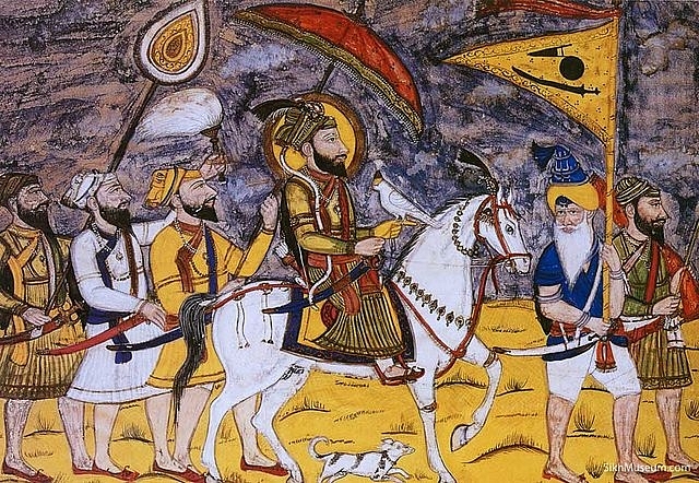 Guru Gobind Singh and five Sikhs on the march