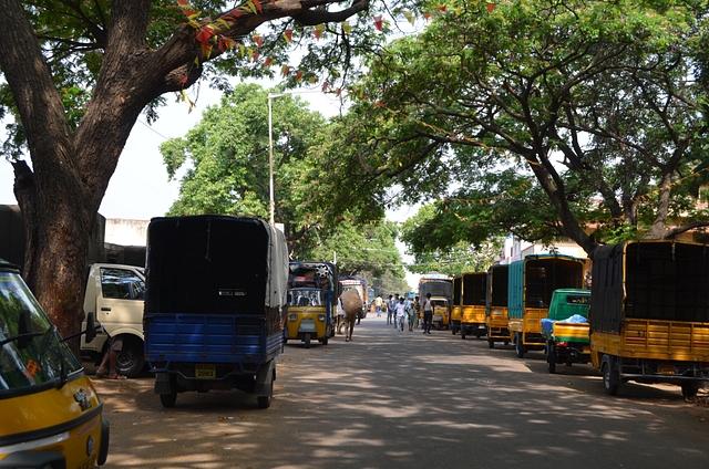 Vehicles parked outside the potato and onion auction platforms at the Yeshwanthpur APMC Yard, north-west of Bengaluru.