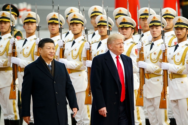 Chinese President Xi Jinping with US President Donald Trump. (Thomas Peter-Pool/Getty Images)