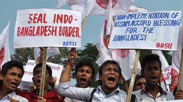 Members of a student union take part in a demonstration against illegal immigrants from Bangladesh. (time8.in)