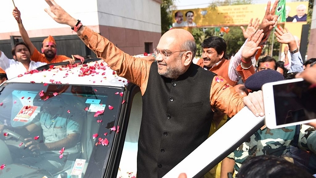 BJP chief Amit Shah arrives at the party headquarters to celebrate BJP’s solid performance in Tripura, Meghalaya and Nagaland.&nbsp; (Sanchit Khanna/Hindustan Times via Getty Images)