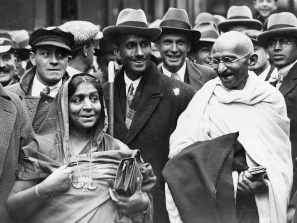 Mahatma Gandhi (1869-1948) at Boulogne station with Sarojini Naidu, on the way to England to attend the Round Table Conference. (Douglas Miller/Getty Images)